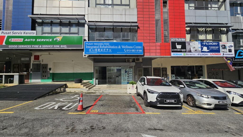 Stroke Rehab and Pain management- A patient undergoing guided therapy to improve upper limb function post-stroke and relief chronic pain. Bukit Jalil